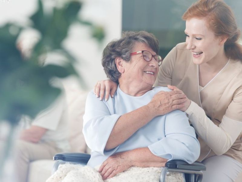 Senior woman enjoying the company of her professional in-home caregiver