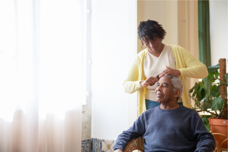 Senior with dementia receiving memory care from Keen Care professional